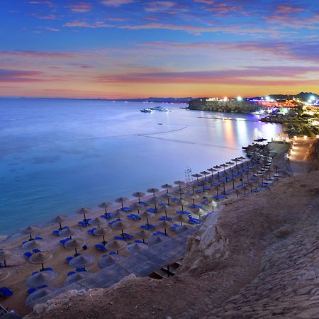 Jaz Fanara Resort Sharm el-Sheikh Exterior photo Sunset at the beach