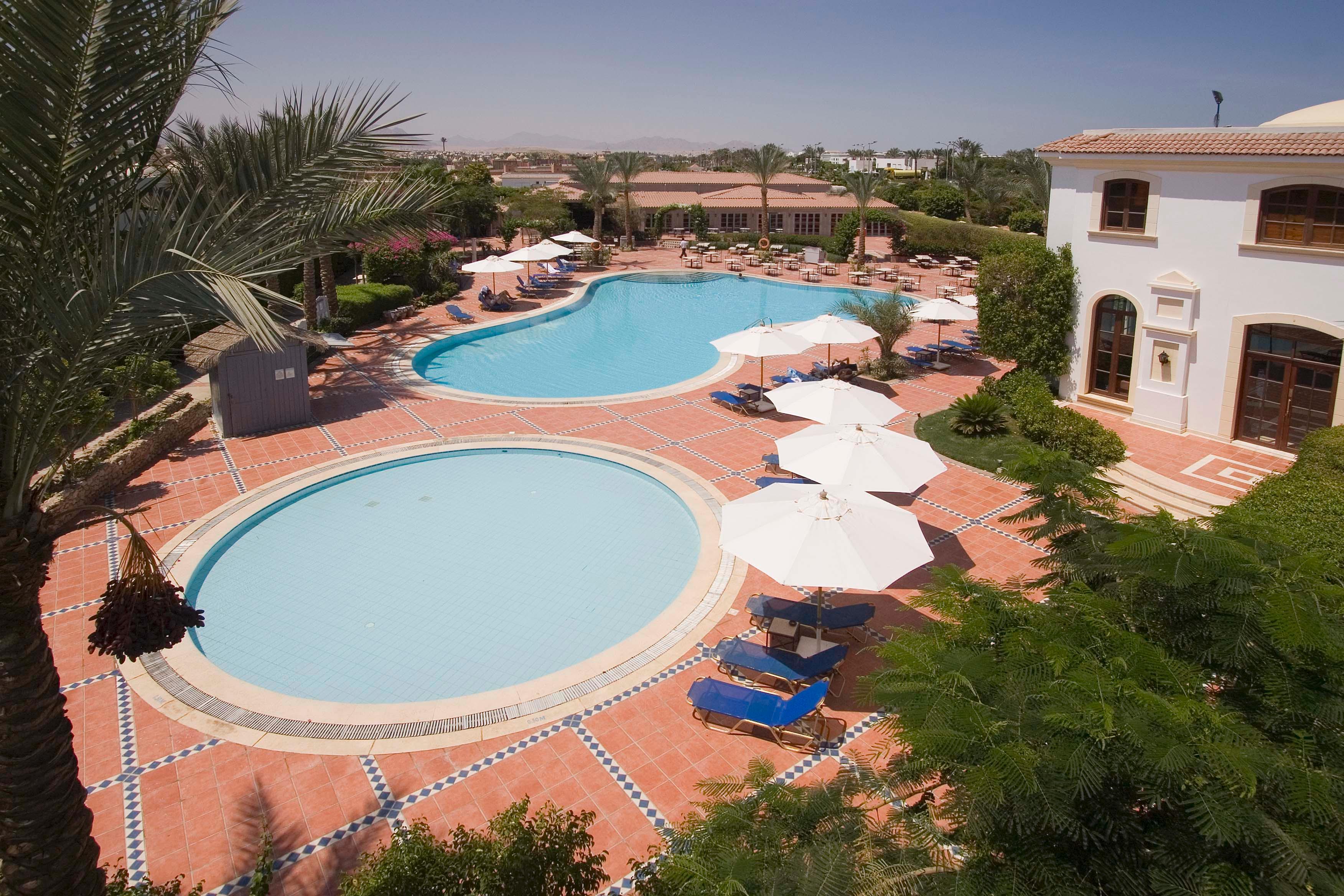 Jaz Fanara Resort Sharm el-Sheikh Exterior photo The swimming pool at the Royal Palm Hotel