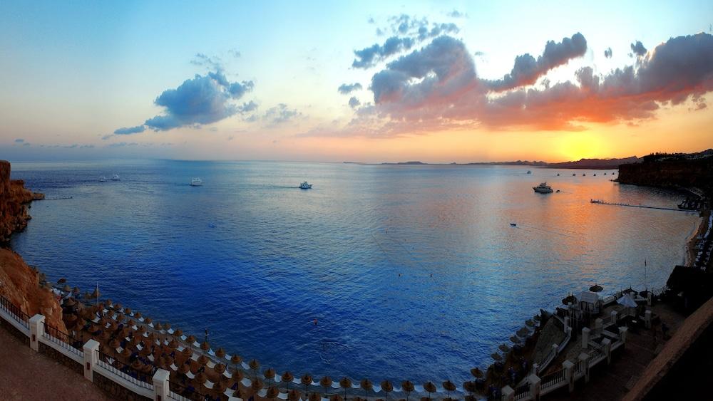 Jaz Fanara Resort Sharm el-Sheikh Exterior photo Sunset over the Gulf of Naples