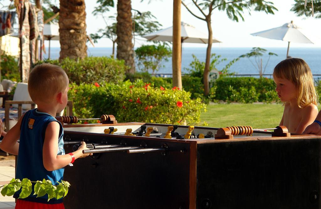 Jaz Fanara Resort Sharm el-Sheikh Facilities photo Two children playing table football